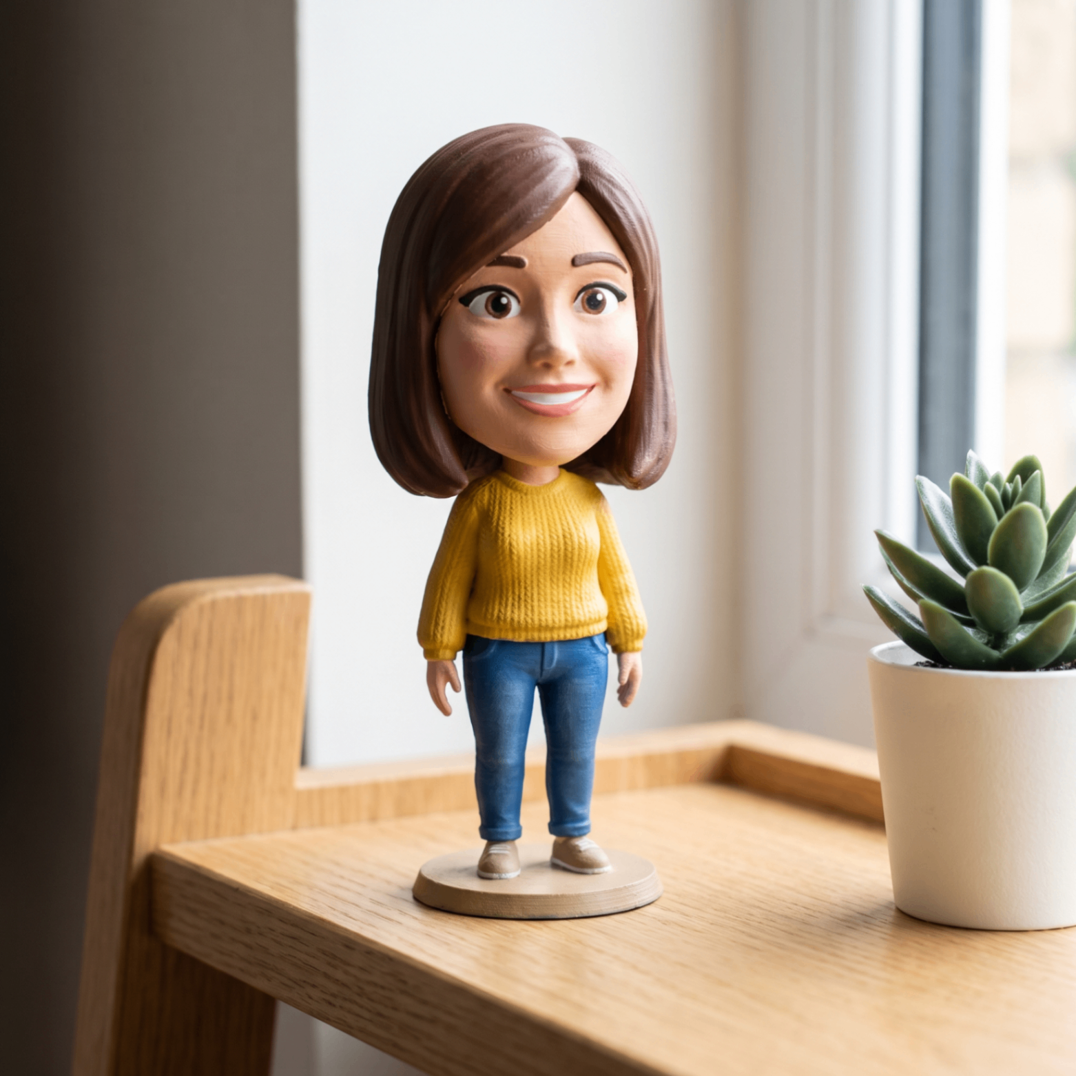 Finished hand-painted figurine of a woman on a shelf